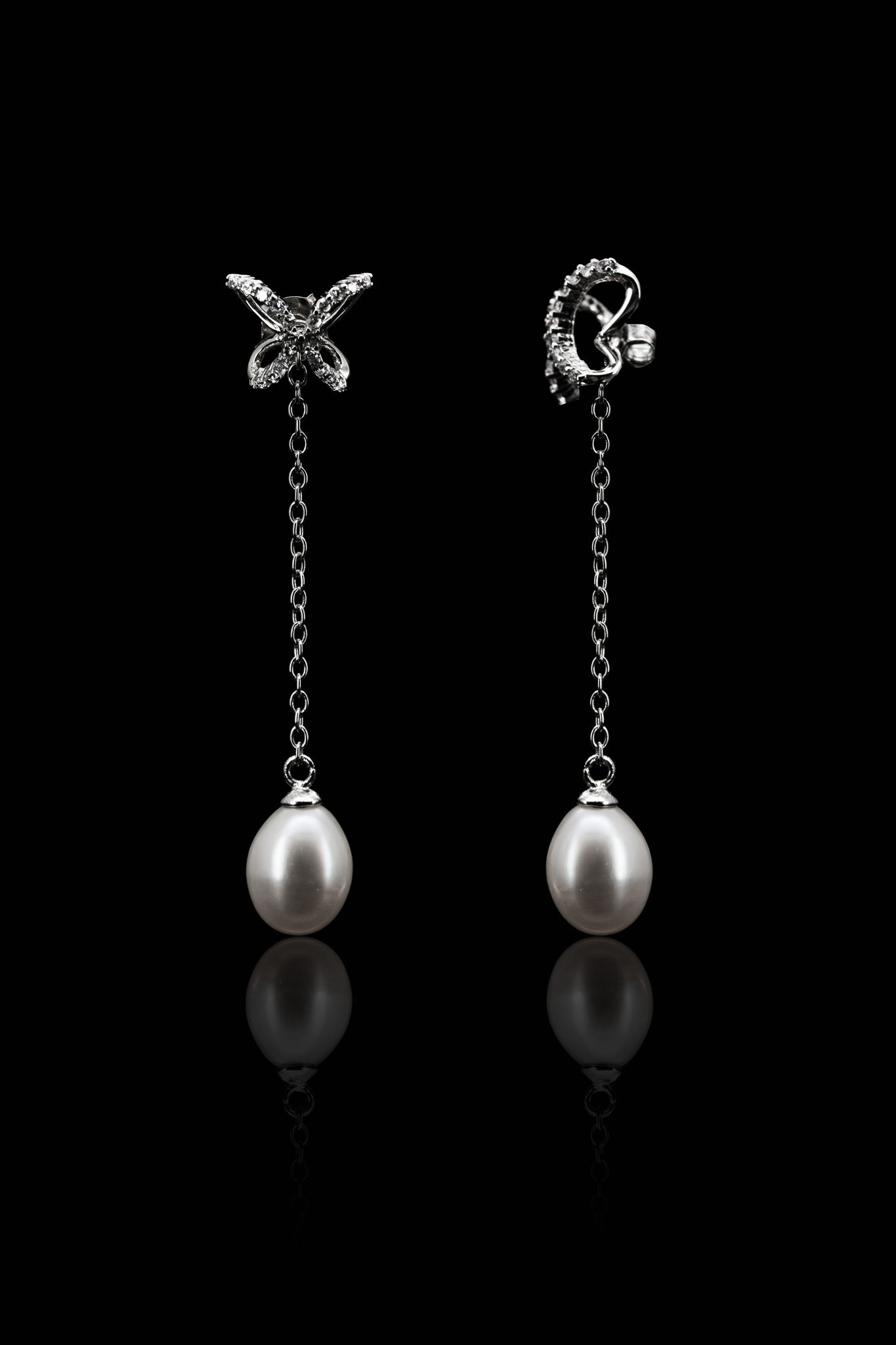 
                  
                    LVE040 TWO-WAY BUTTERFLY DROP EARRINGS
                  
                